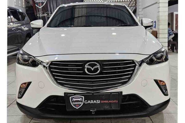 CX 3 Touring AT